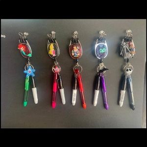 Badge holder with pen and marker